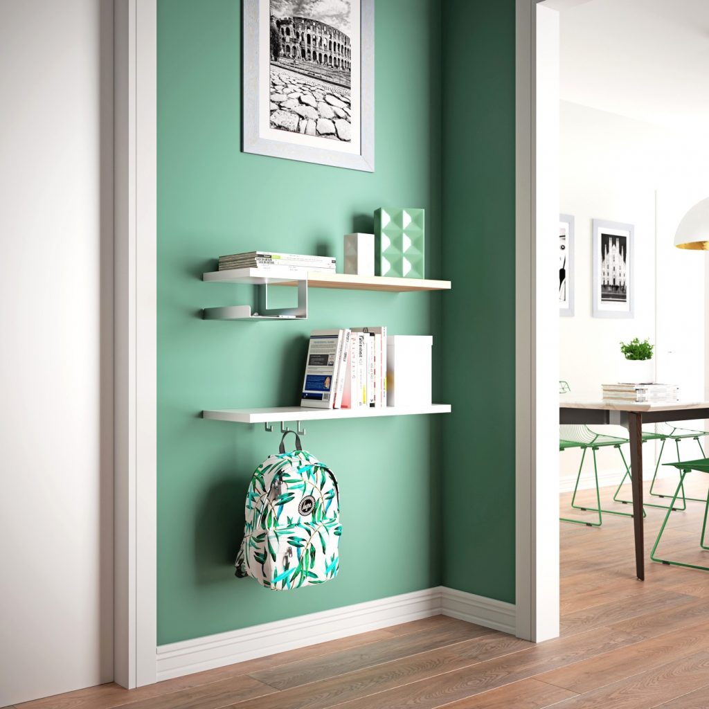 quadro appeso in cucina con parete verde