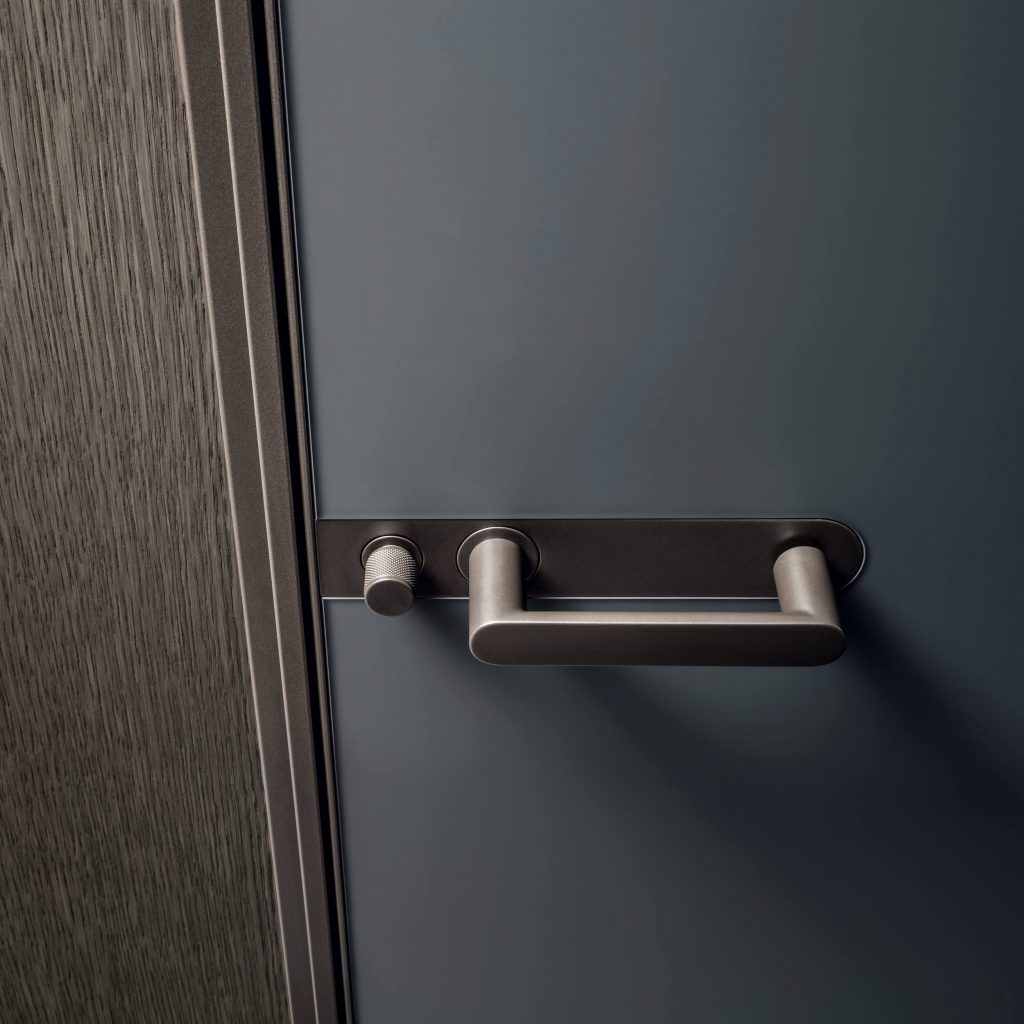 Maniglie porte a filo muro 